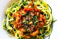 Vegan Puttanesca Zoodles: Tangy Tomato & Olive Zucchini Noodles