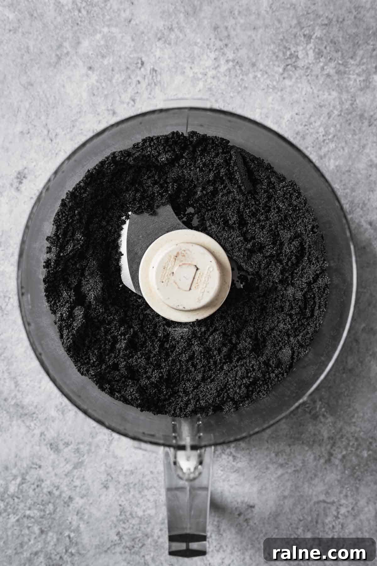 Chocolate Cookie Crust Recipe for Perfect Pie and Cheesecake 6 Wafer cookie crumbs in the bowl of a food processor.