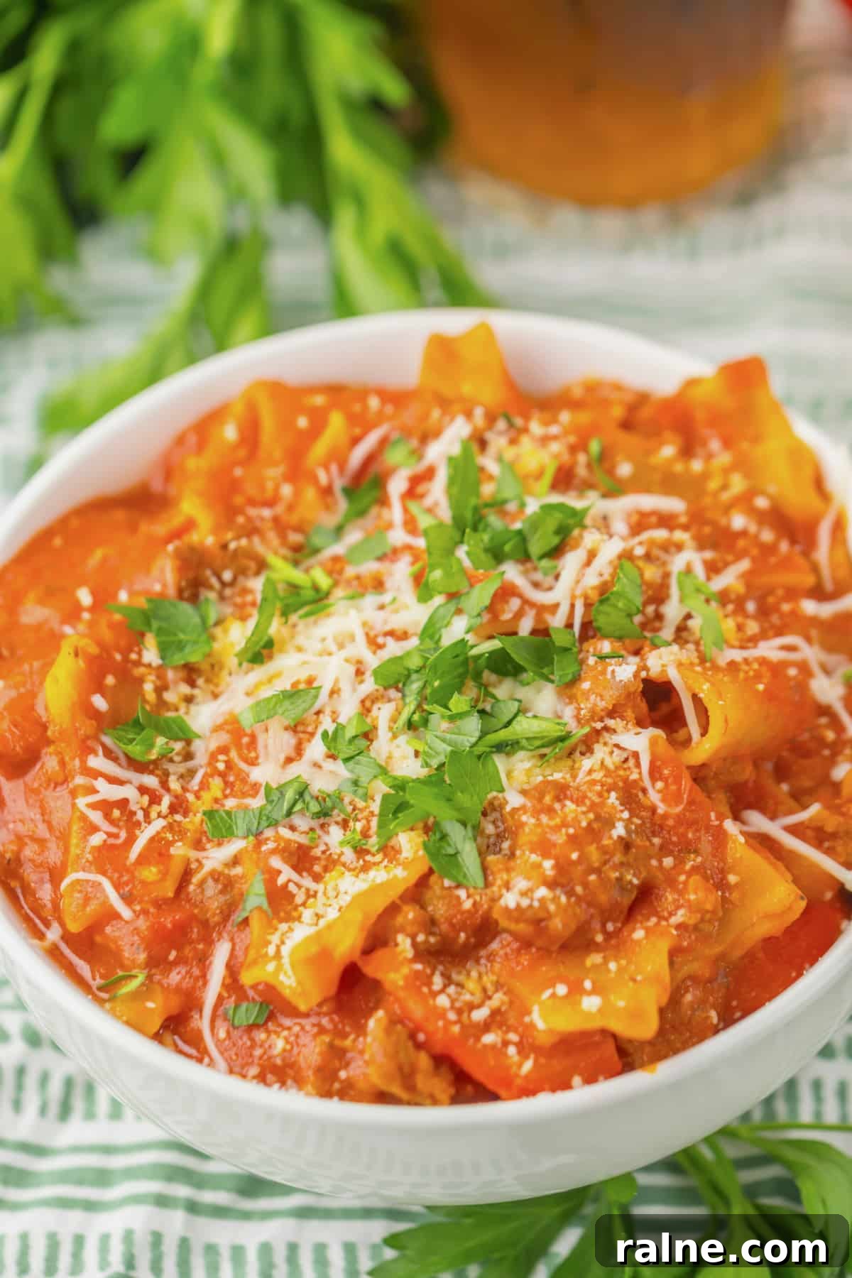 White bowl filled with lasagna soup.