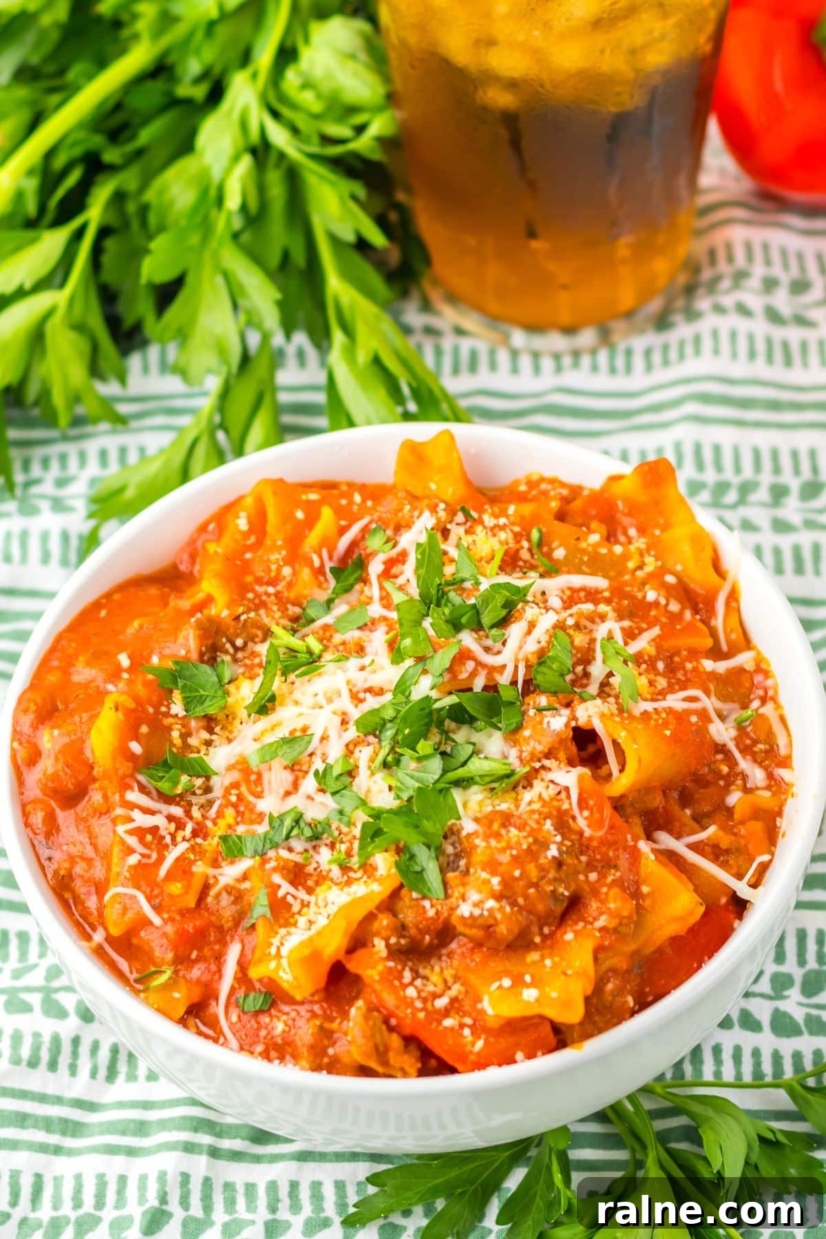 White bowl filled with lasagna soup.