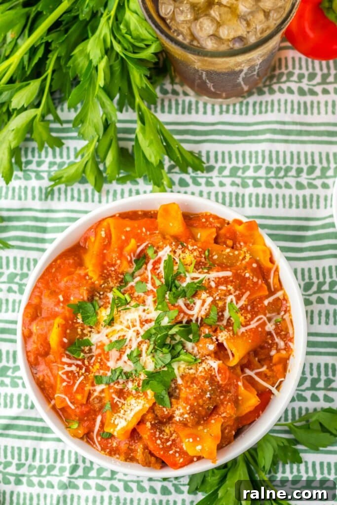 White bowl filled with lasagna soup.