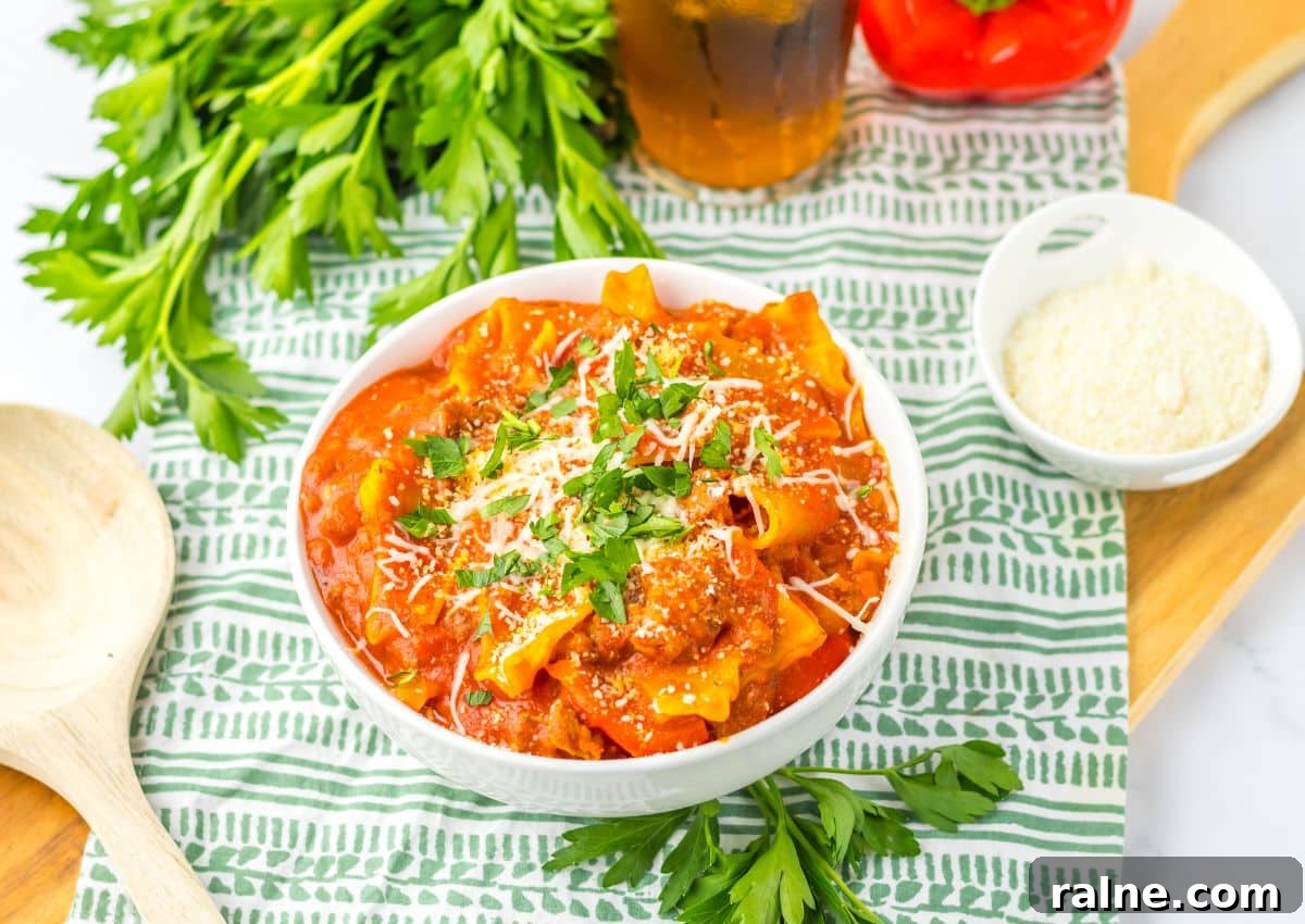 White bowl filled with lasagna soup.