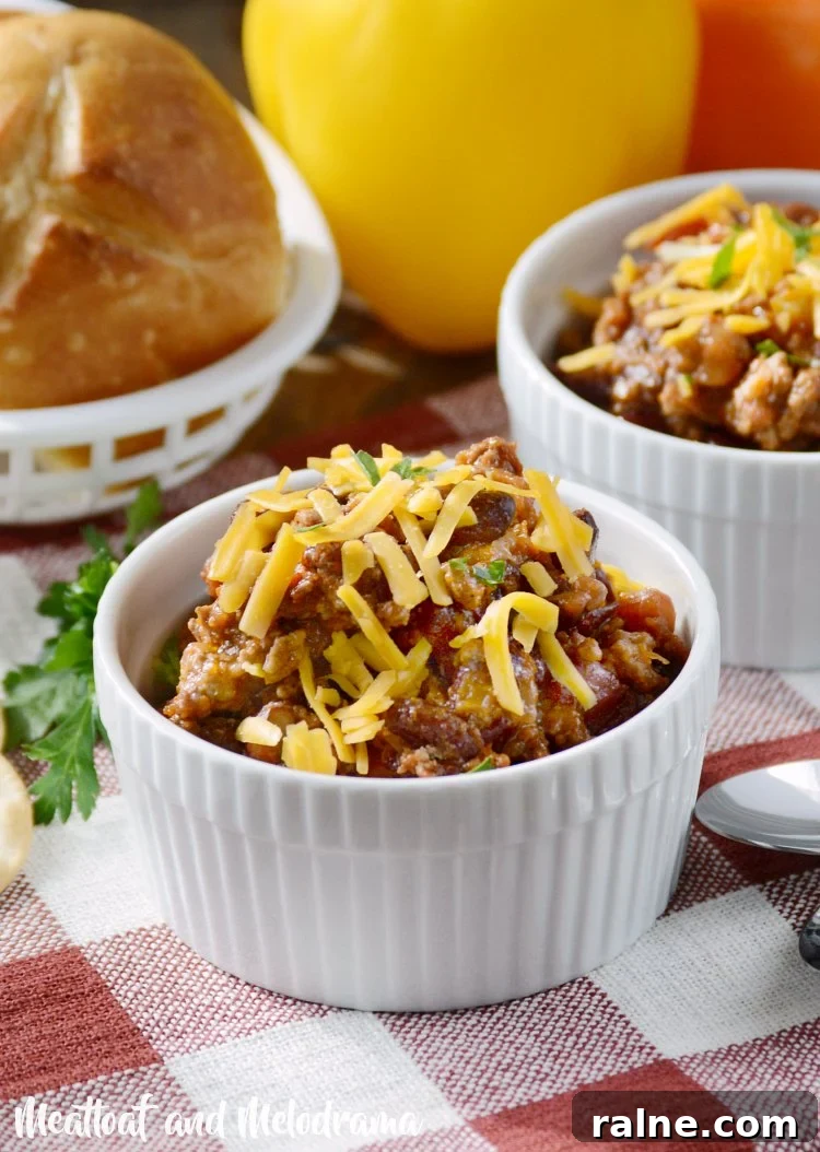 Classic Stove-Top Mom’s Chili Recipe for Weeknight Dinners 10 mom's best chili recipe with shredded cheese in bowl