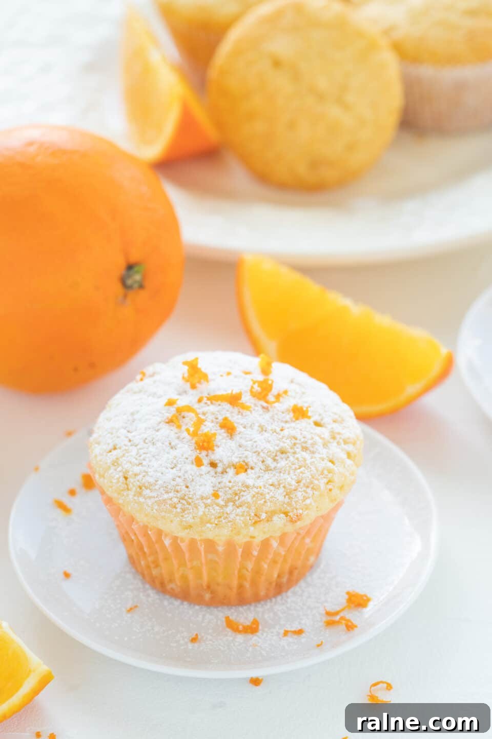 Fluffy Orange Yogurt Muffins with Zesty Citrus Glaze 3 Orange Muffins