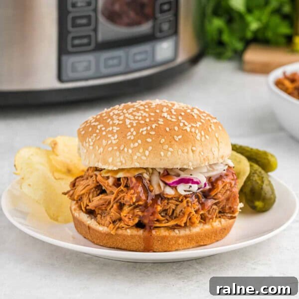 Slow-Cooker Spaghetti with Savory Meat Sauce 7 Crockpot bbq chicken on a bun.