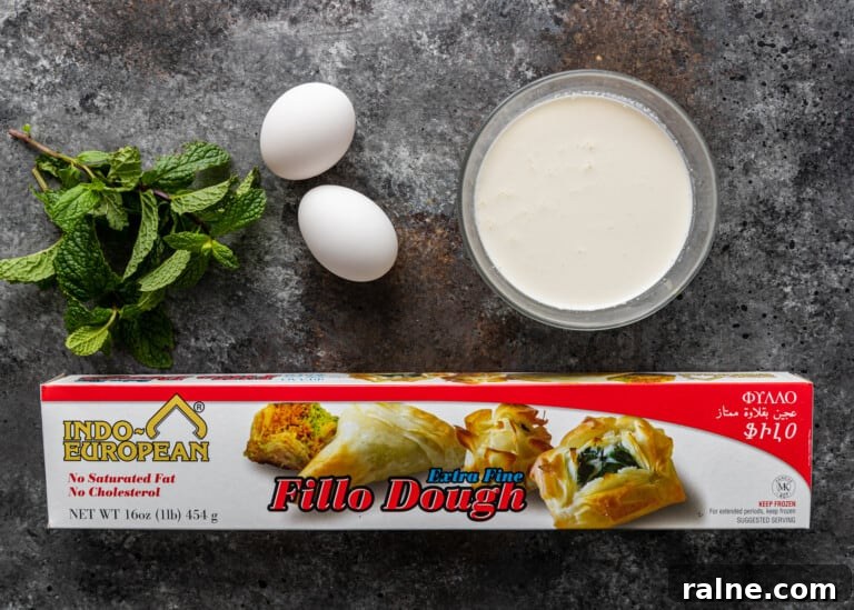 Tiropita: Authentic Greek Cheese Pie Recipe & Tips 6 overhead: tiropita ingredients on counter