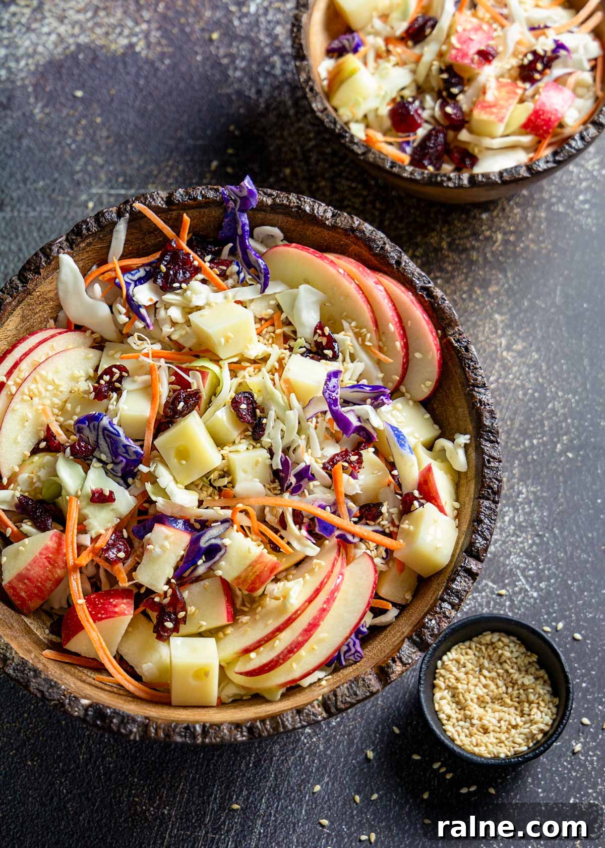 Asian Cabbage and Apple Slaw with Tangy Dressing 2 Asian-style salad with cabbage, apples, and Swiss cheese.