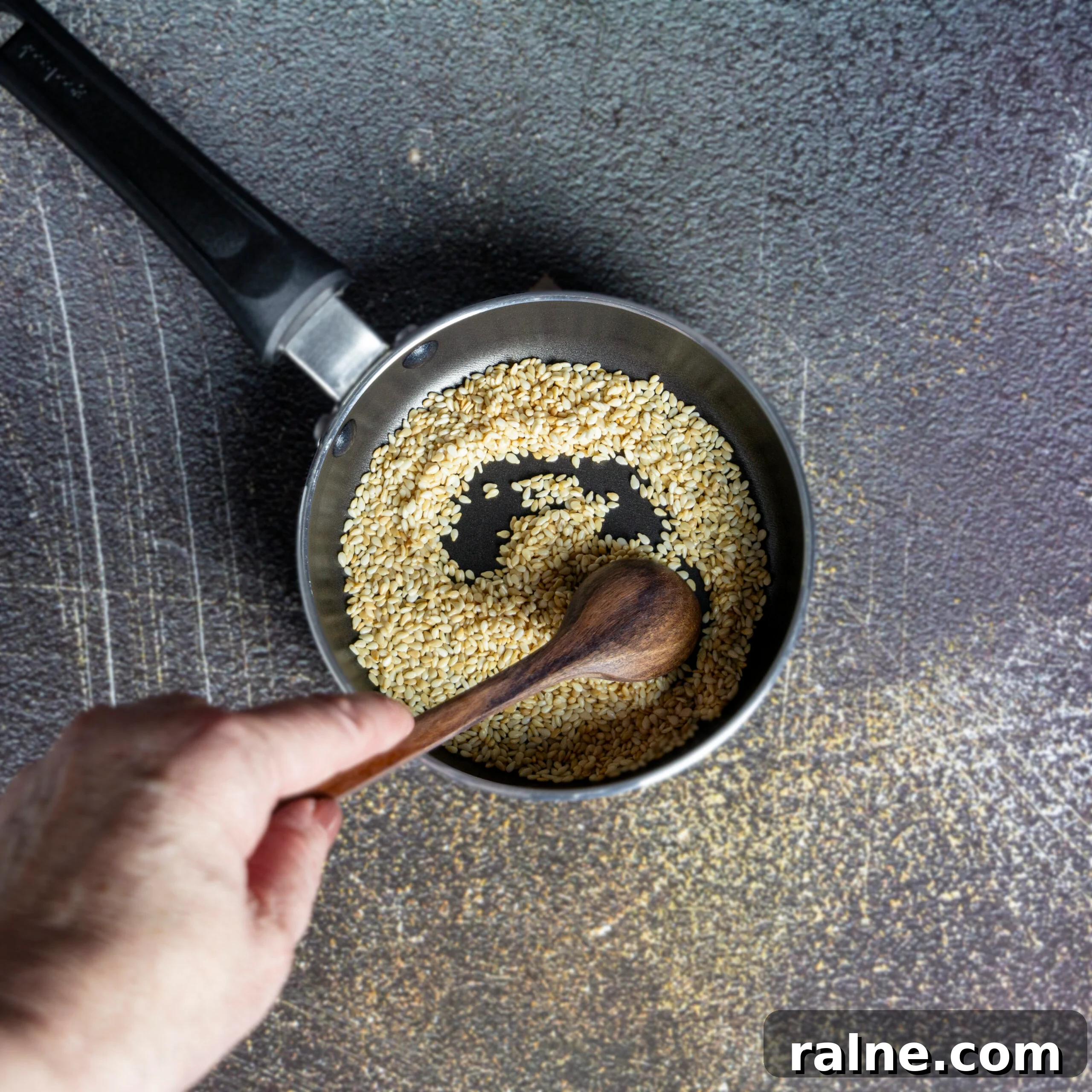 Asian Cabbage and Apple Slaw with Tangy Dressing 5 Toasting sesame seeds in a small skillet.