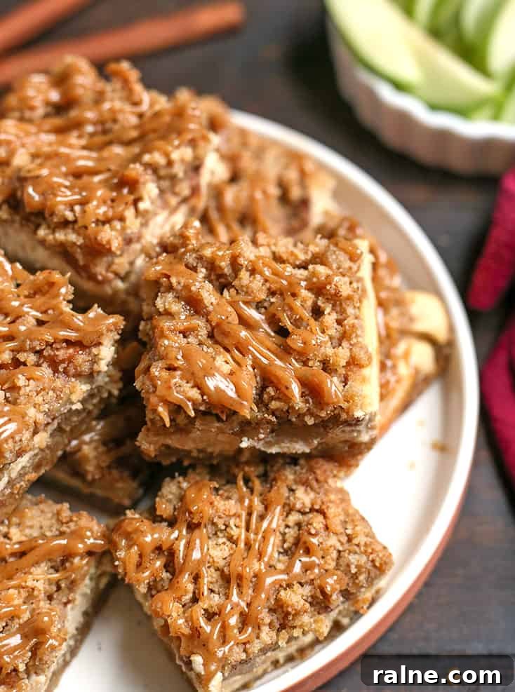 plate of grain free caramel apple cheesecake bars 