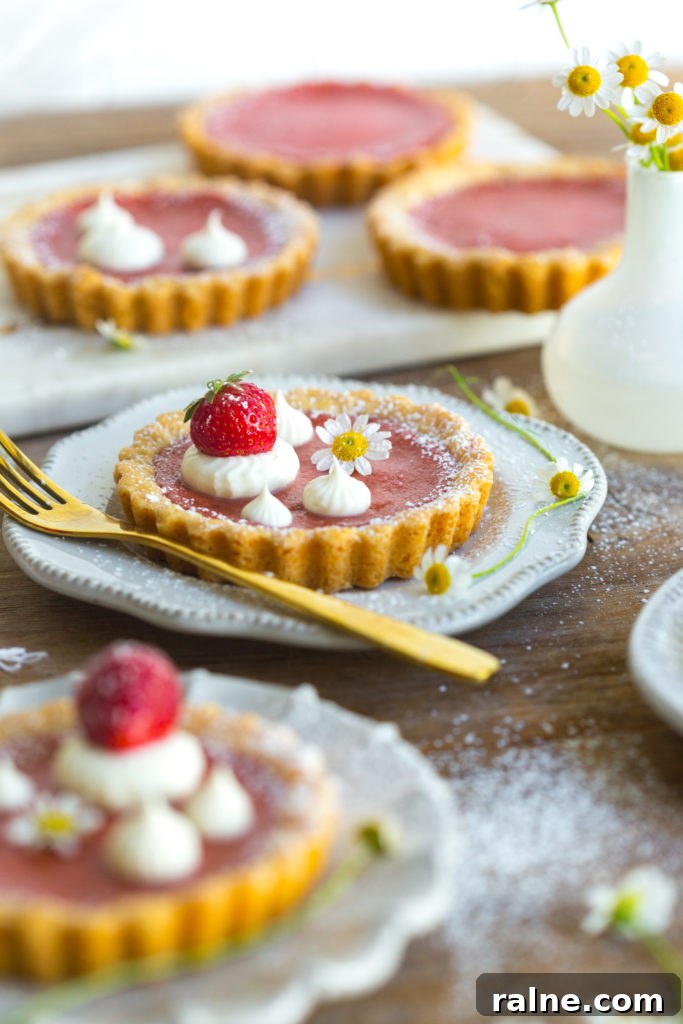 Strawberry Rhubarb Curd Tartlets Recipe for Tangy Spring Desserts 19 Strawberry Rhubarb Curd Tartlets with creme friache