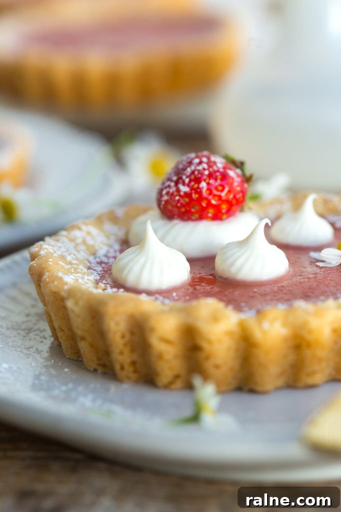 Strawberry Rhubarb Curd Tartlets Recipe for Tangy Spring Desserts 21 Strawberry Rhubarb Curd Tartlet with creme fraiche
