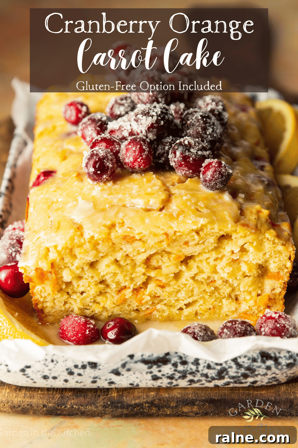 Cranberry Orange Carrot Cake Recipe with Zesty Glaze 10 pinterest image of a cranberry orange carrot cake topped with sugared cranberries.