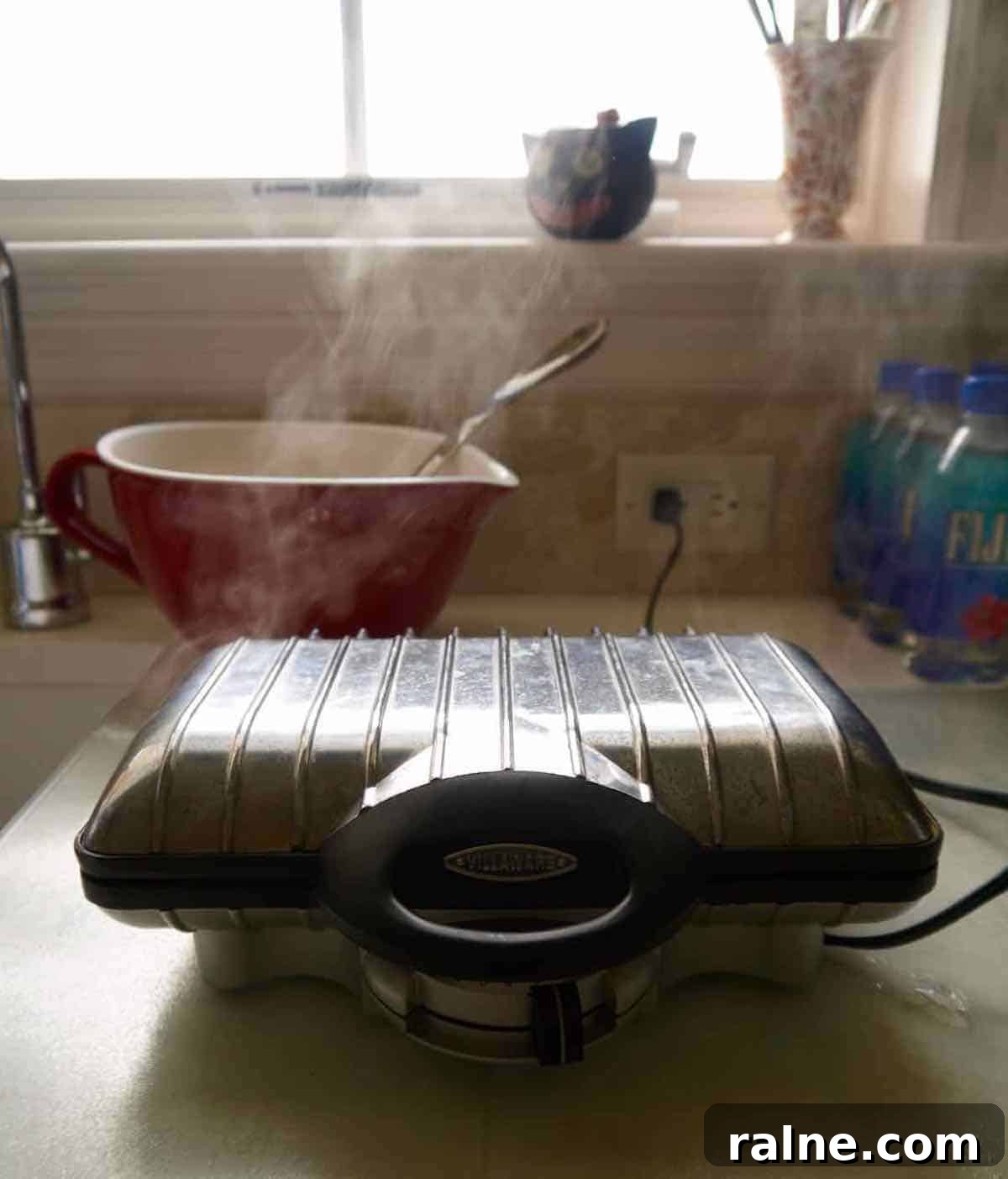Pumpkin Paleo Waffles — Gluten- and Dairy-Free Recipe 6 Waffle maker cooking paleo pumpkin waffles.