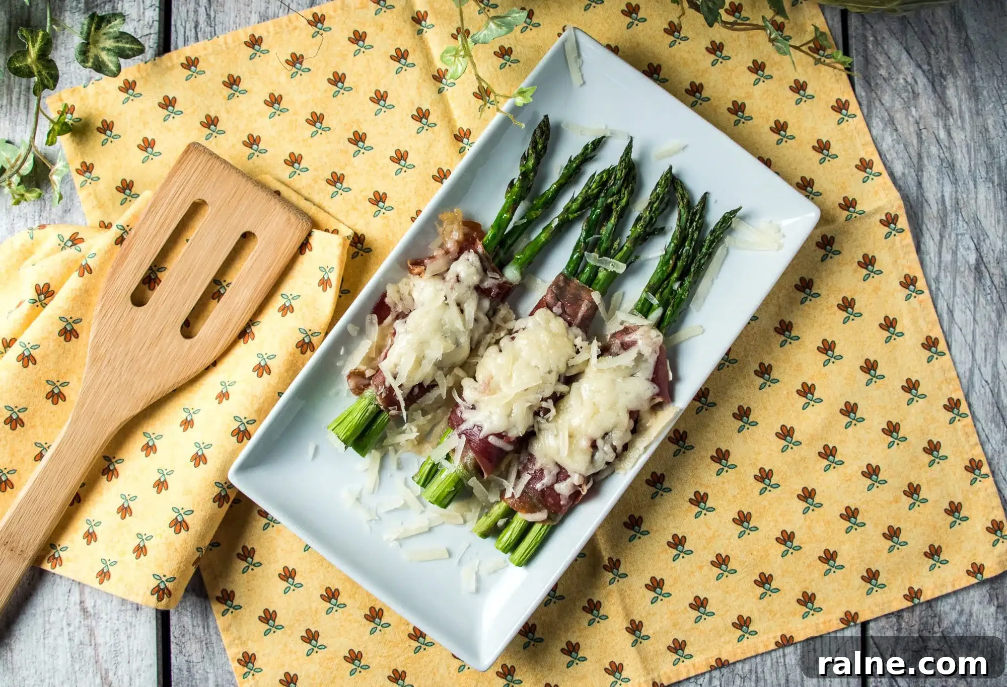 Asparagus, Ham & Manchego Tart Recipe: Savory Spring Brunch Idea 7 Plated asparagus bundles
