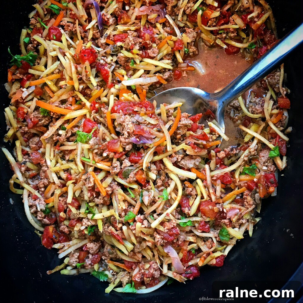 Slow-Cooker Slawghetti: Hearty Sausage Spaghetti Casserole 2 Slawghetti is broccoli slaw cooked in the slow cooker to a soft 'spaghetti' consistency. This is a great low-carb, paleo, and whole30 alternative to spaghetti that's not spaghetti squash.