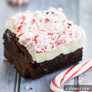 White Chocolate Peppermint Brownies Recipe - Fudgy, rich, and decadent White Chocolate Peppermint Brownies make a festive and delicious holiday treat with a fudgy brownie, white chocolate, and crushed candy canes. A perfect festive and easy Christmas dessert and treat!