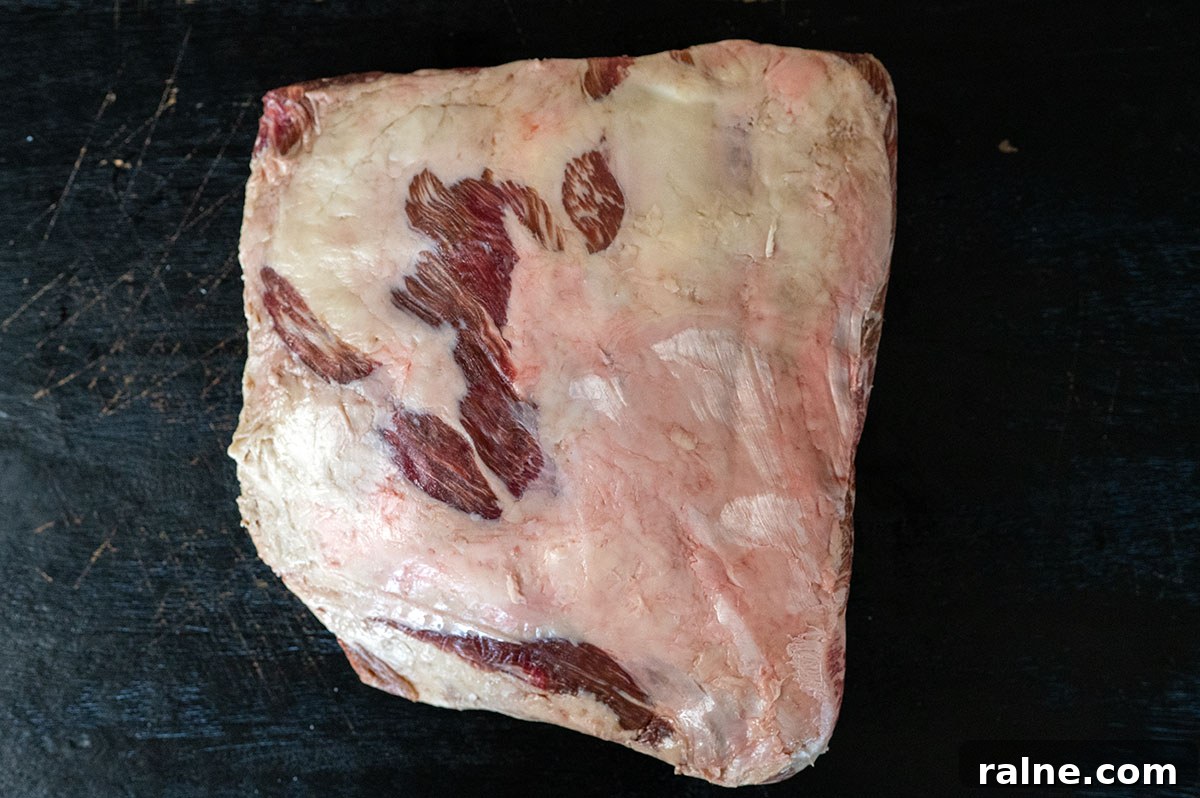 Beef Ribs Guide: Short Ribs, Back Ribs, Flanken & Cooking Tips 6 raw plate ribs on black board.