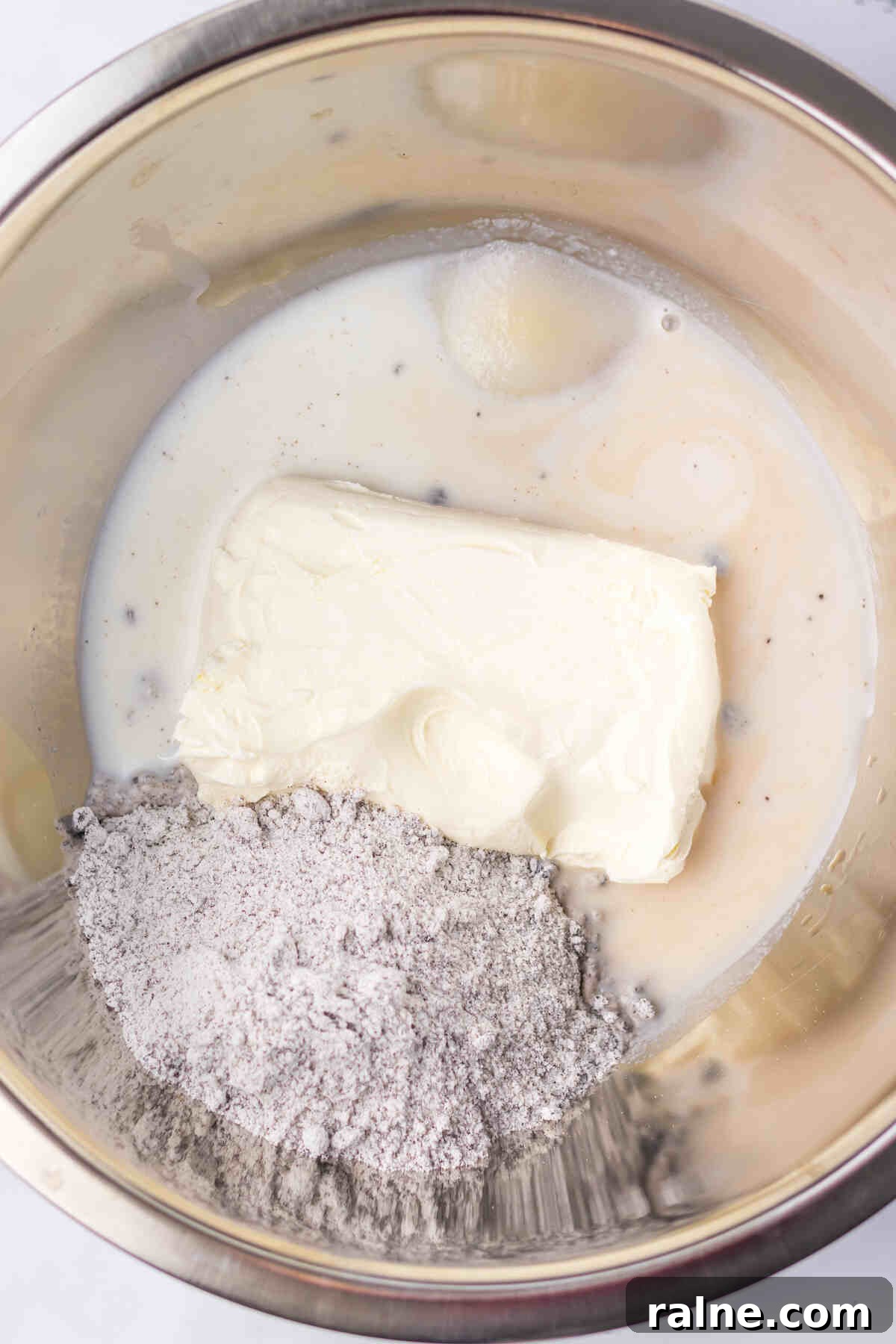 Creamy Oreo Fluff Dessert Recipe: No-Bake Oreo Delight 4 the fluff dessert ingredients in a large mixing bowl