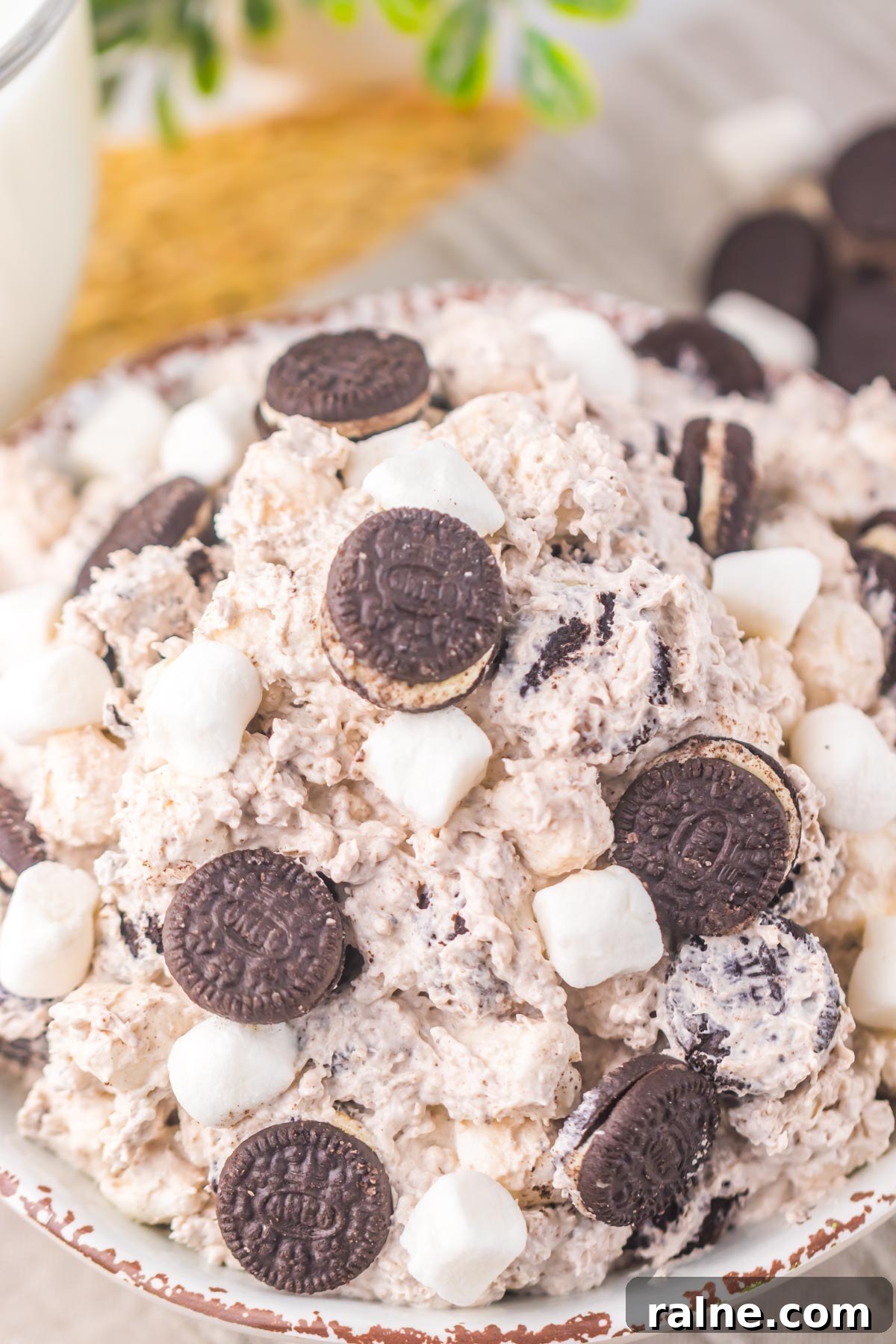 Creamy Oreo Fluff Dessert Recipe: No-Bake Oreo Delight 9 close up view of the oreo fluff in a large serving bowl.