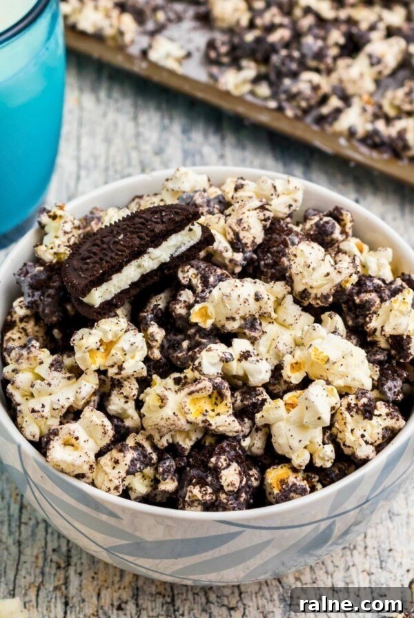 Cheesy Garlic Stuffed Mushrooms with Herb Breadcrumbs 14 Popcorn combined with melted white chocolate and Oreo cookies crushed, with glasses of milk on the table.