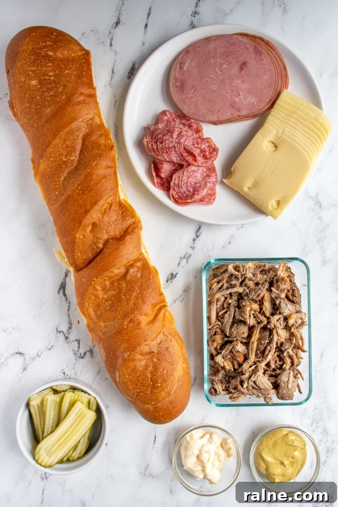 How to Make an Authentic Cuban Sandwich at Home 4 Overhead view of ingredients for making cuban sandwiches laid out on a tabletop.