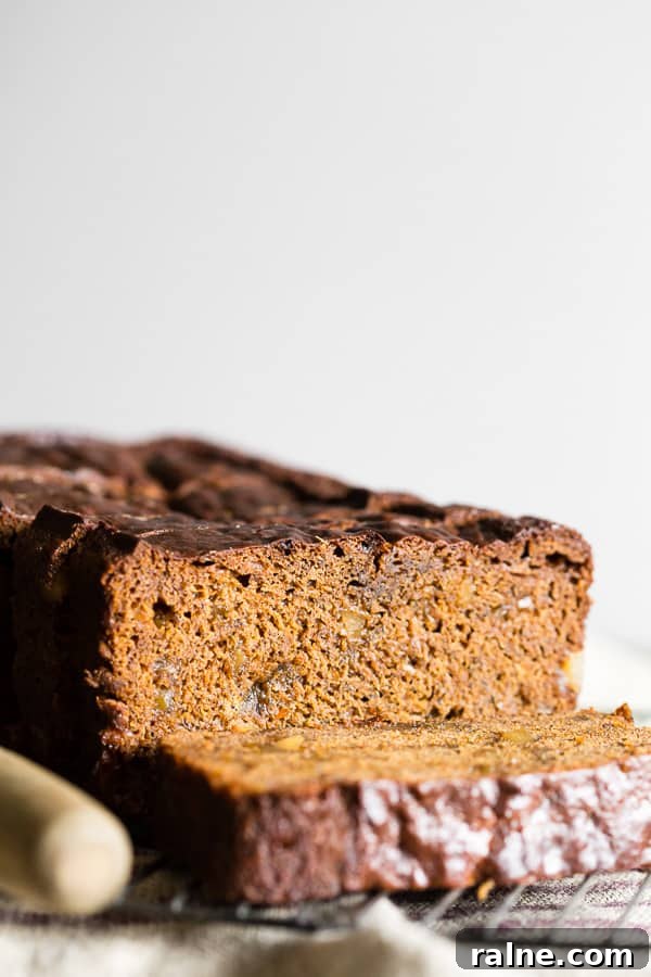 Gingerbread Banana Bread Recipe: Spiced Loaf with Molasses 2 Gingerbread Banana Bread sliced on a cooling rack.