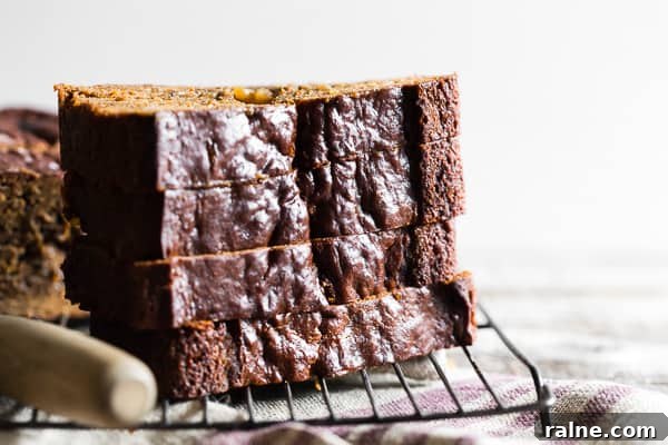 Gingerbread Banana Bread Recipe: Spiced Loaf with Molasses 3 Gingerbread Banana Bread sliced and stacked.
