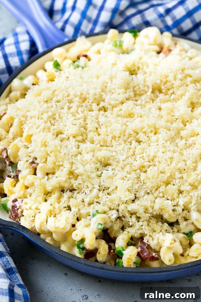 Jalapeño Popper Macaroni and Cheese Recipe 7 Macaroni and cheese topped with panko breadcrumbs and parmesan cheese.