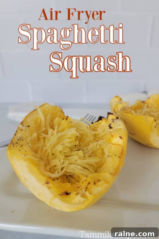 Crispy Air Fryer Spaghetti Squash with Garlic Parmesan 2 Air fryer spaghetti squash over air fried spaghetti squash on a white plate