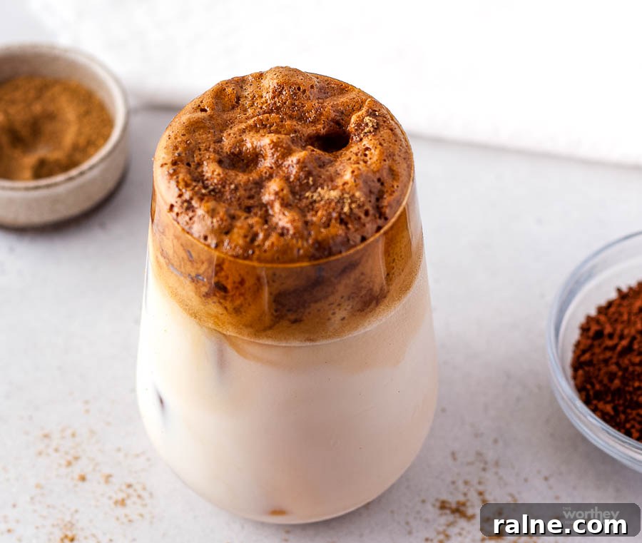 pumpkin Dalgona Coffee recipe in a tall glass