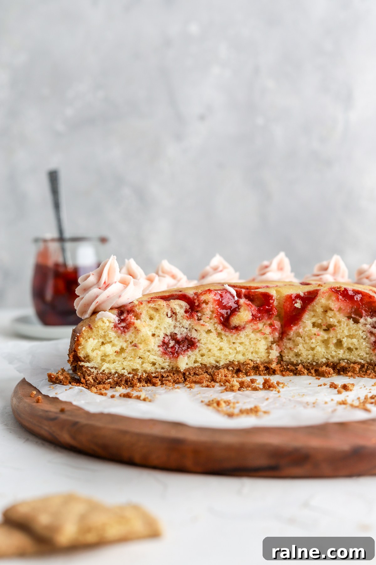 Pie-Inspired Birthday Cake Ideas for a Memorable Celebration 15 Cake baked on a graham cracker crust, swirled with pie filling and topped with frosting.