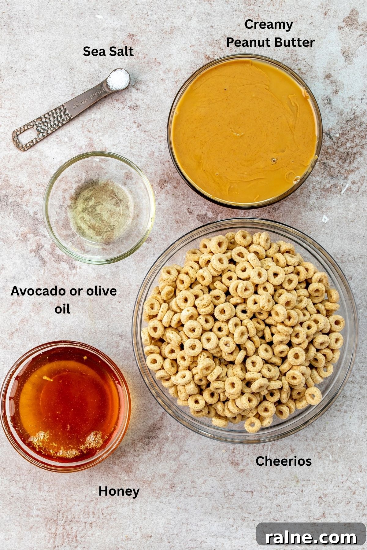 No-Bake Peanut Butter Cheerio Bars Recipe 3 Ingredients needed to make this yummy recipe on a countertop.