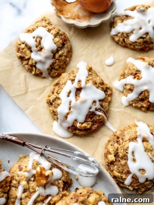 No-Bake Peanut Butter Cheerio Bars Recipe 8 carrot cake cookies on parchment paper.