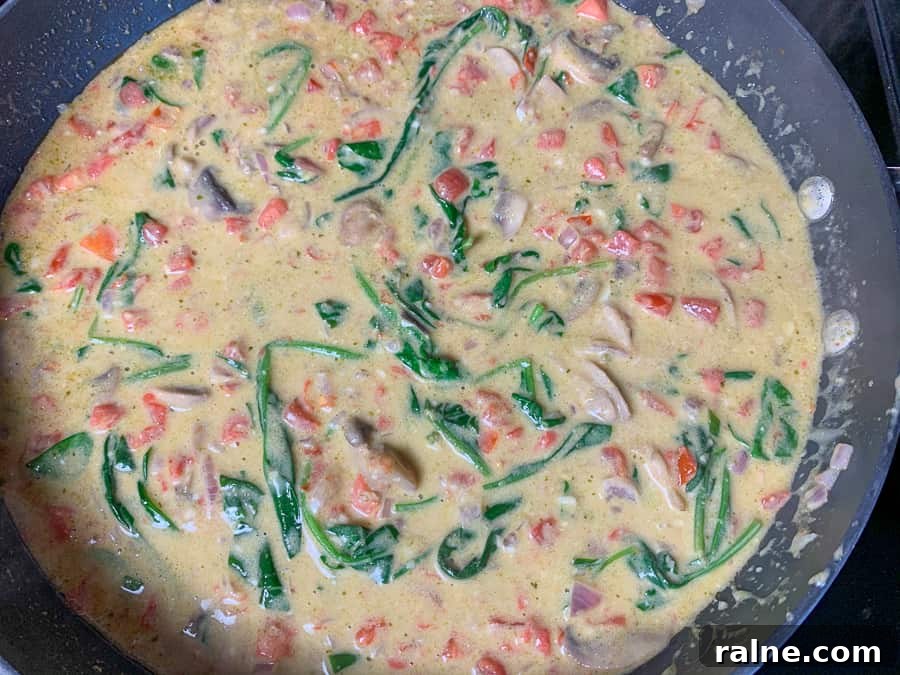 Alfredo sauce and pesto added