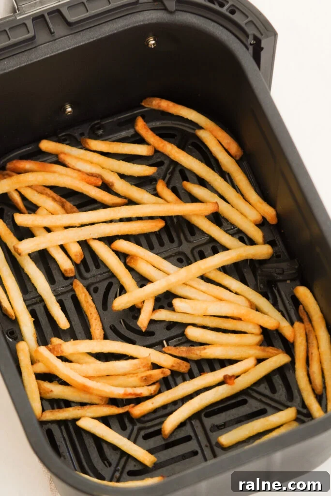 Frozen fast food style fries in the air fryer after cooking