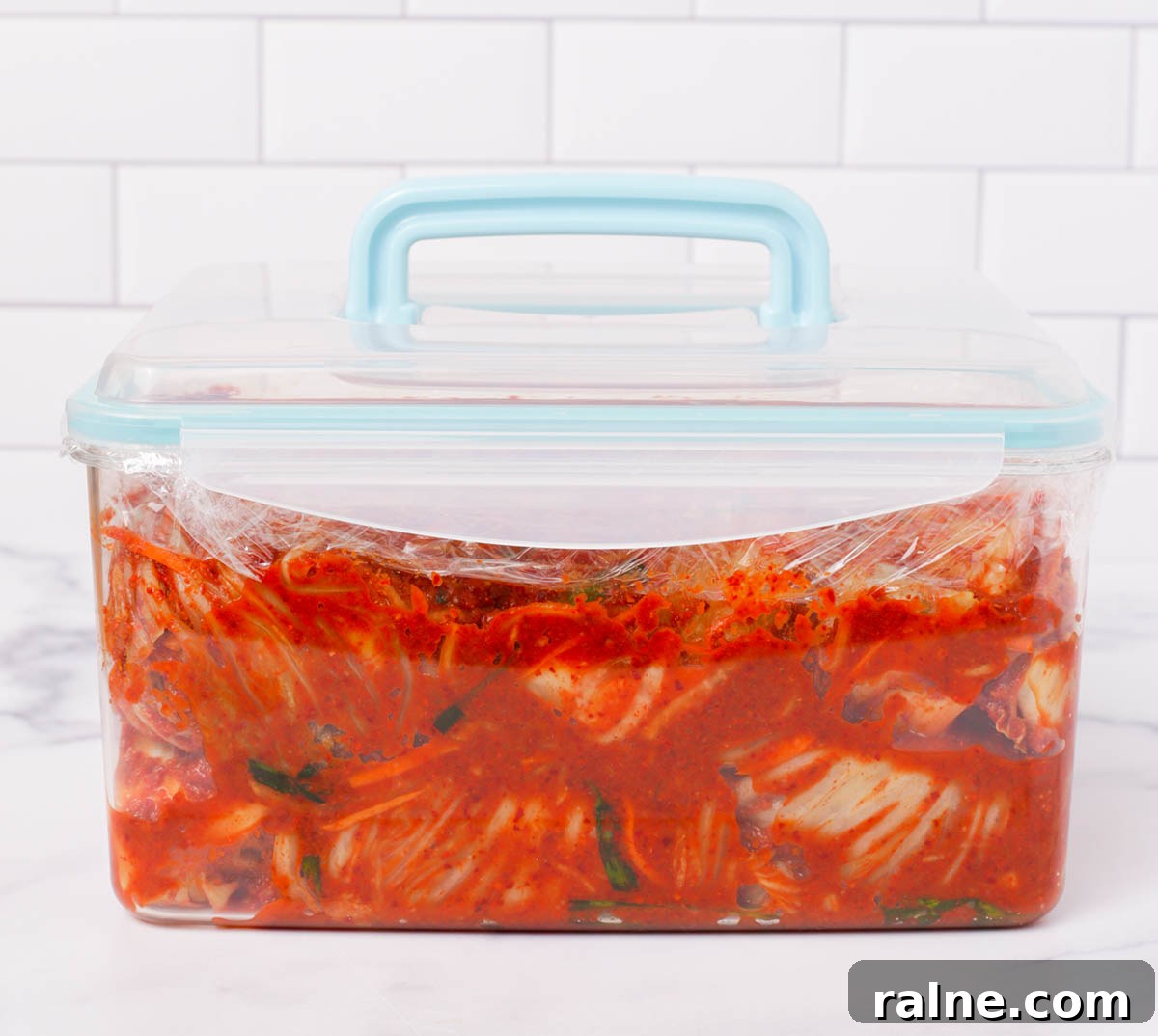 Napa Cabbage Kimchi Recipe: Authentic Homemade Kimchi Guide 29 Kimchi packed in container.