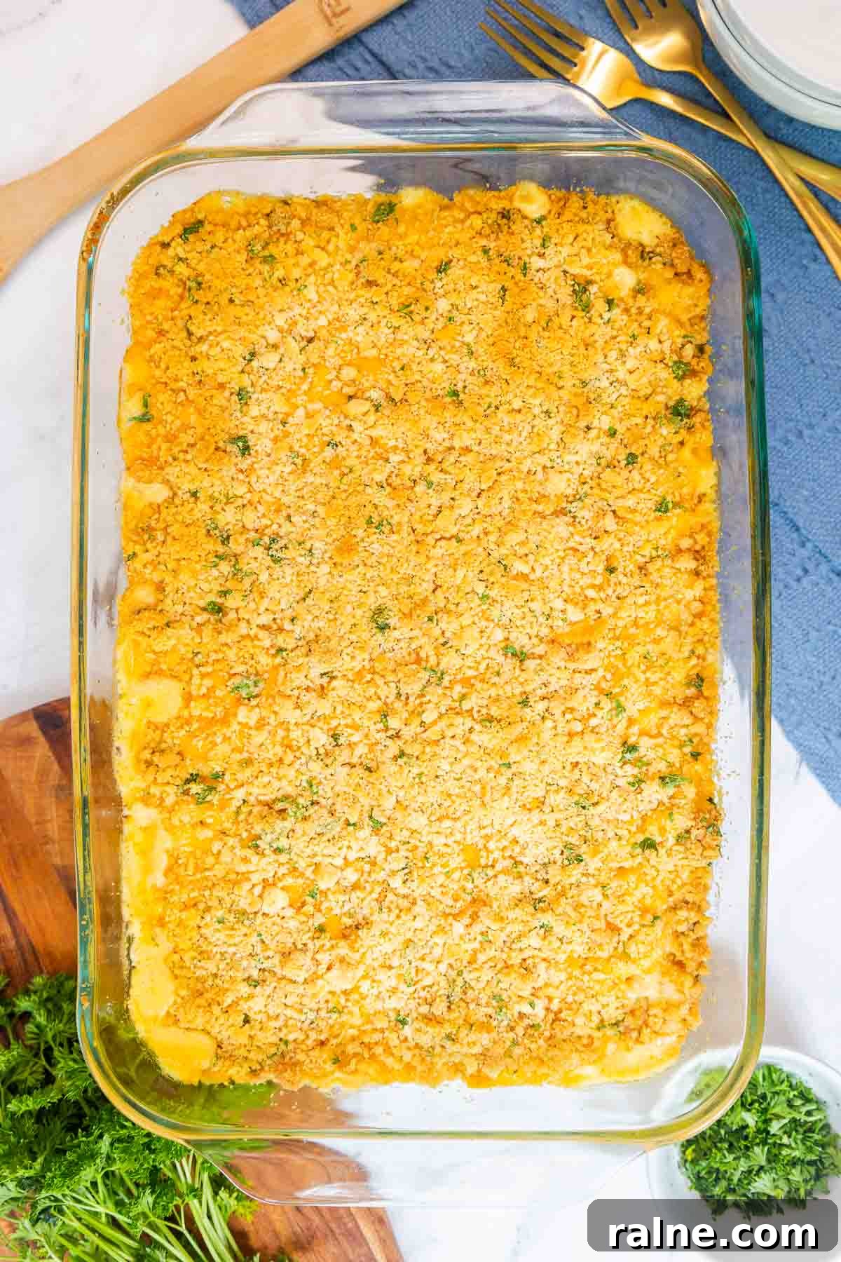 Old-Fashioned Baked Mac and Cheese with Ritz Cracker Topping 9 Freshly baked old fashioned mac and cheese with a crisp, golden Ritz cracker crust in a glass baking dish.
