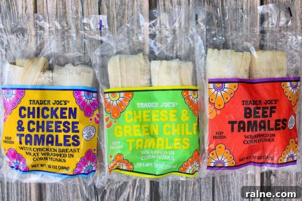 three different types of trader joes frozen tamales in plastic packaging