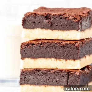 Shortbread Brownies Recipe: Buttery Crust and Fudgy Center 7 Stack of three shortbread brownies, one on top of each other