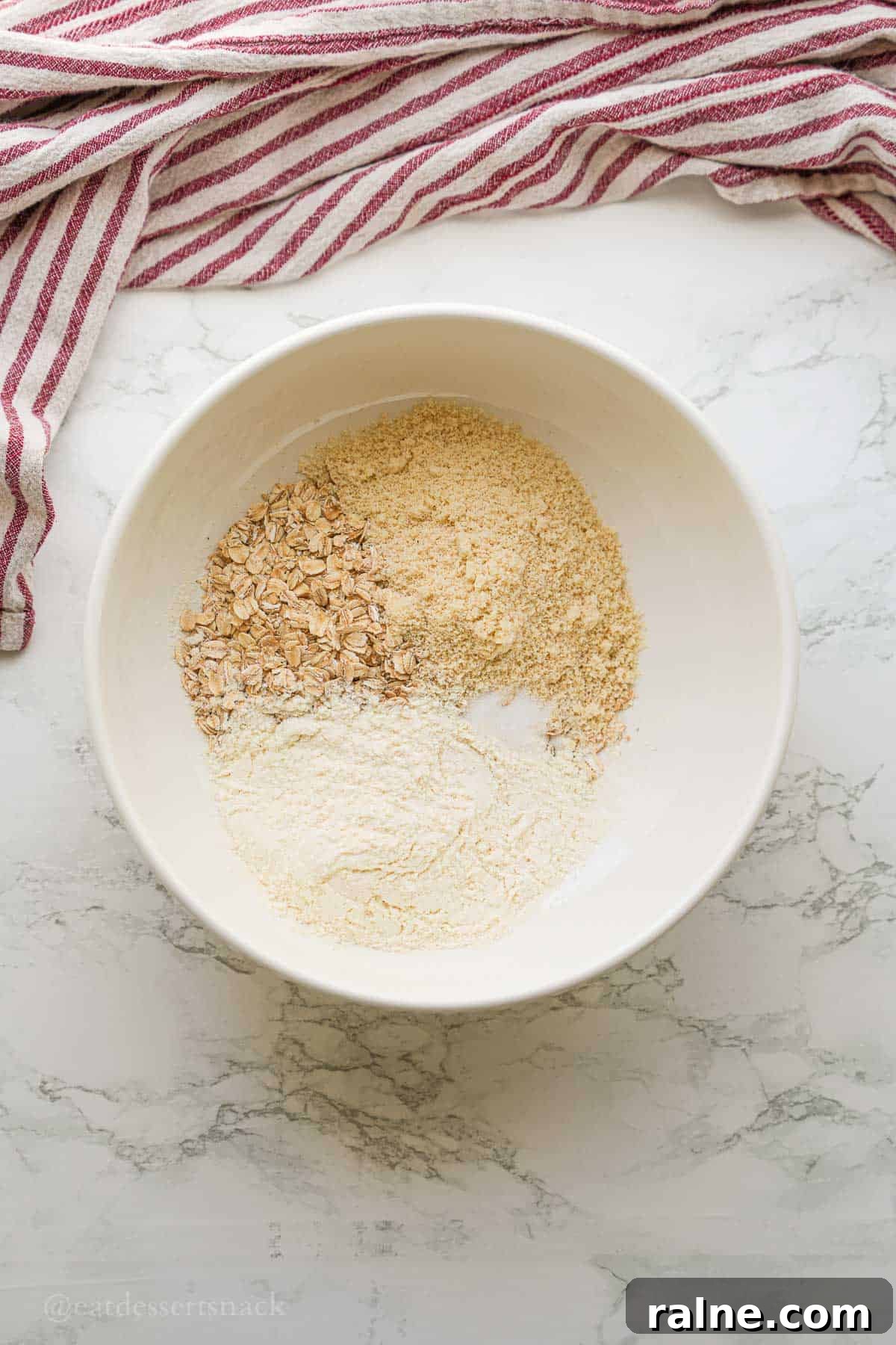 Almond Butter Protein Energy Bites for On-the-Go Snacks 4 Dry ingredients in bowl.