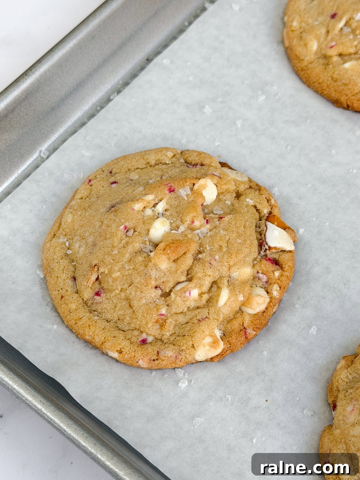 a side view of a white chocolate peppermint pretzel cookies.