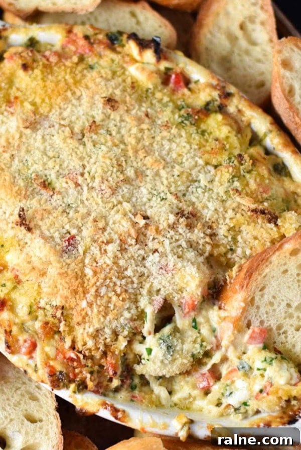 Cream Cheese Tortilla Roll-Ups: 5-Minute Party Appetizer Recipe 12 Cream cheese crab dip in an au gratin dish.