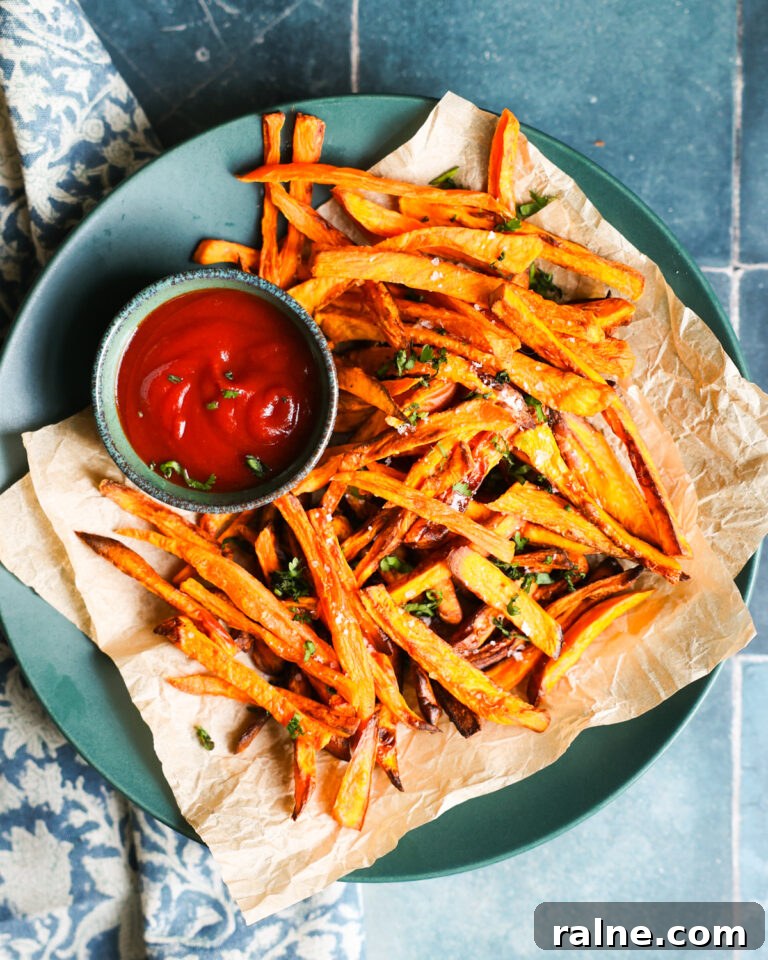 Delicious Sweet Potato Recipes for Every Meal 11 Overhead of air Fryer Sweet Potato Fries