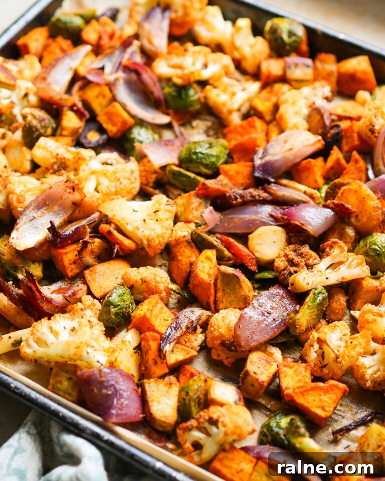 Delicious Sweet Potato Recipes for Every Meal 15 Roasted veggies on a baking sheet.
