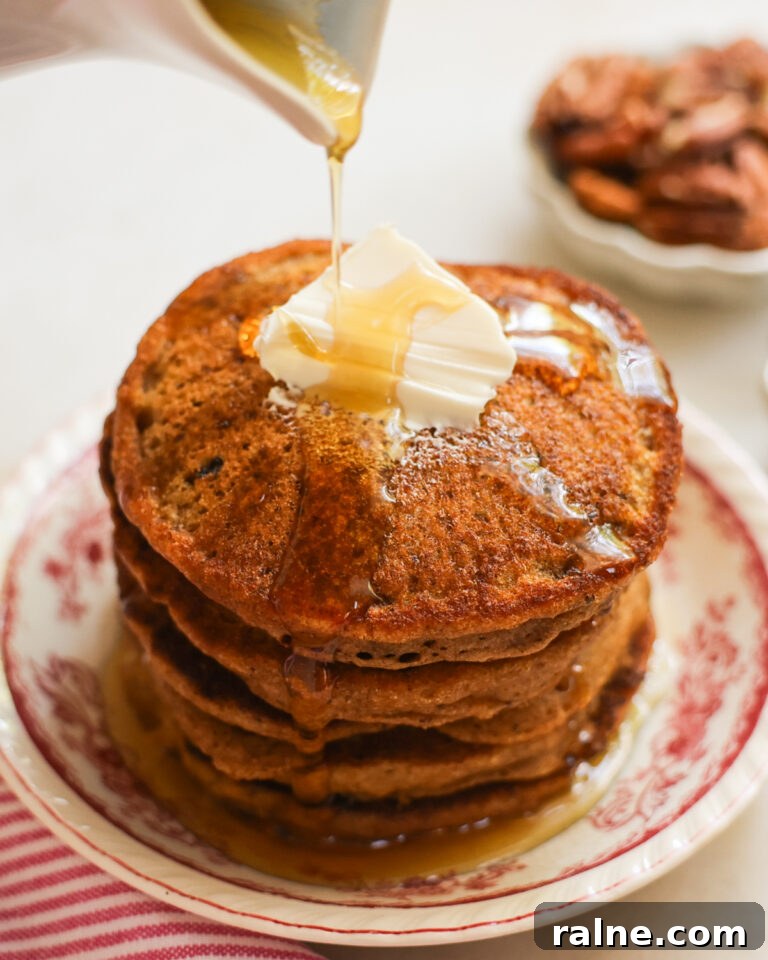 Delicious Sweet Potato Recipes for Every Meal 22 vegan sweet potato pancakes topped with maple syrup