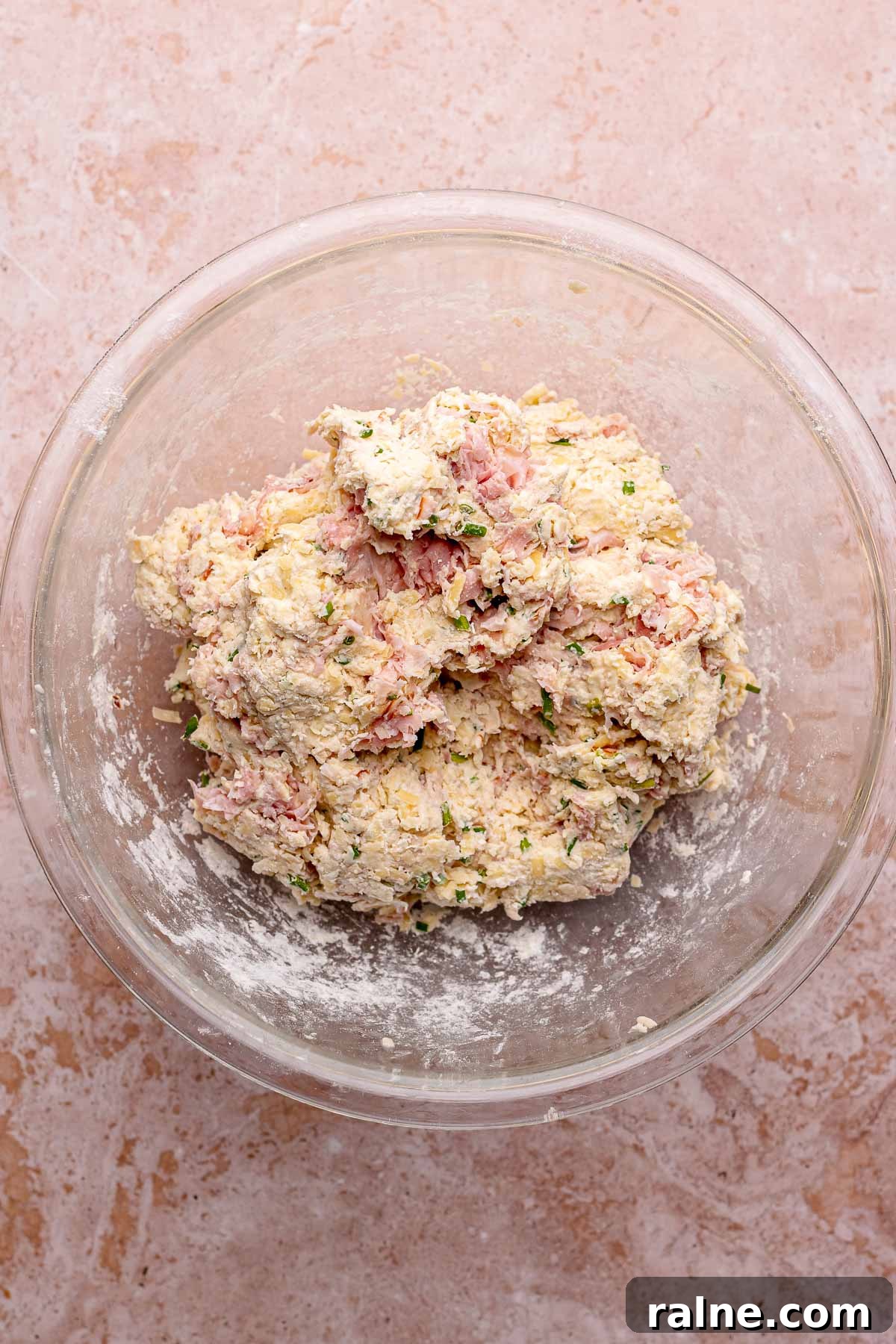 Savory Ham and Cheese Scones Recipe for Brunch or Snacks 7 Finished ham and cheese scone dough mounded in a bowl.