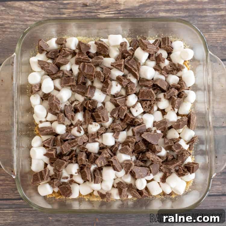 Decadent S'mores Casserole Recipe for Family Desserts 8 chocolate on top of marshmallows