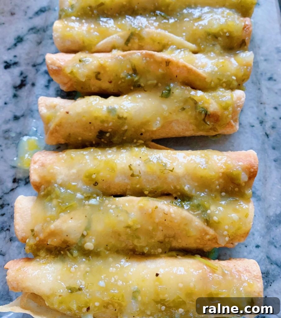 green enchiladas ready for the oven #greenenchiladas #chickenenchiladas