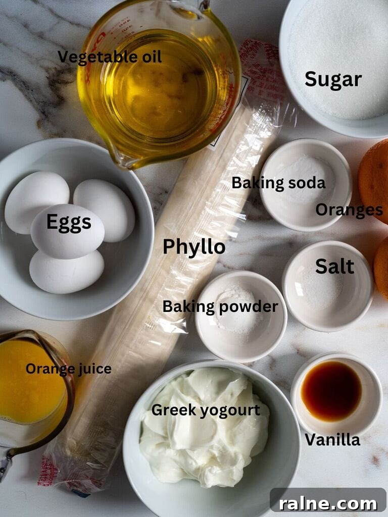 Orange Semolina Cake (Portokalopita) 5 Ingredients for the cake for the Portokalopita: Vegetable oil, sugar, phyllo, baking soda, baking powder, salt, oranges, vanilla, Greek yogourt, Orange juice and eggs.