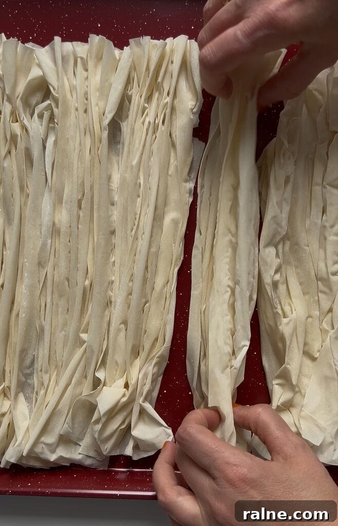 Orange Semolina Cake (Portokalopita) 7 Baking the phyllo sheets in oven, in order to dry them.